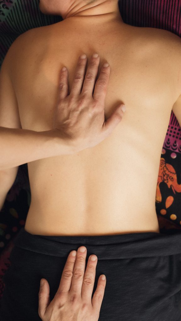 A woman's back massaged